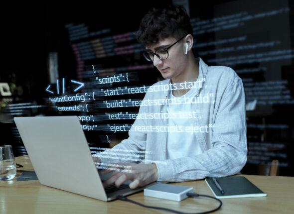 programming-background-with-person-working-with-codes-computer (1)
